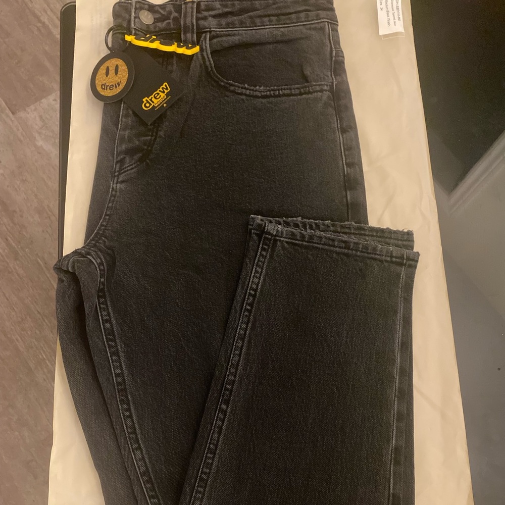 Drew house distressed black wash tapered jean
